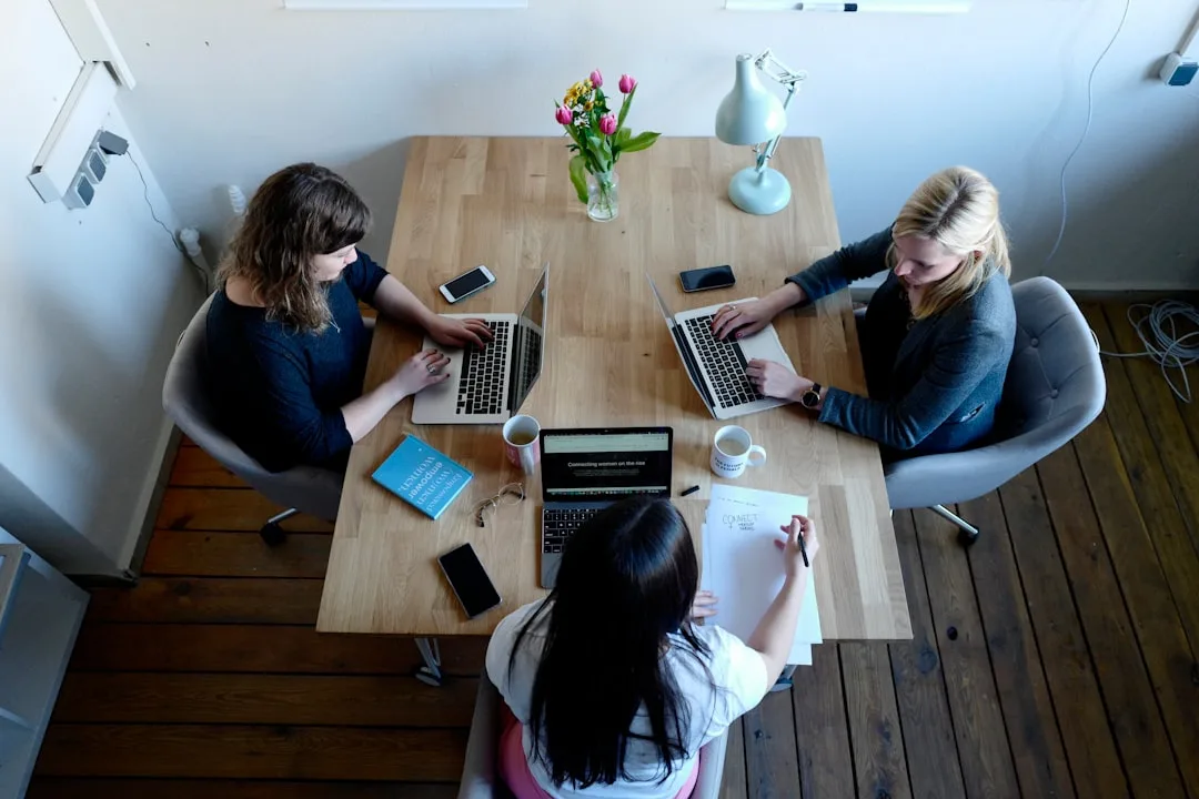 team collaborating around table