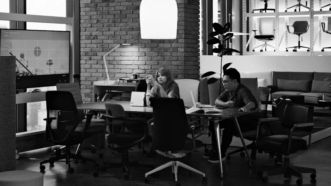 team discussing project around table